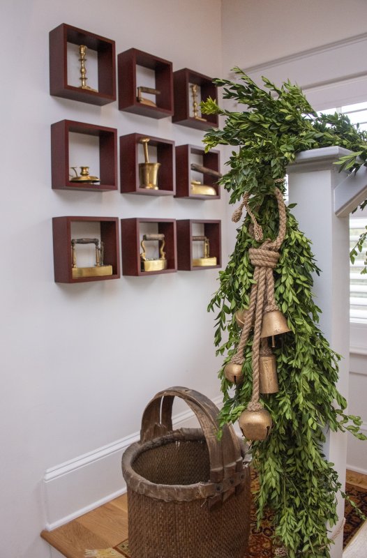 Tri and Brian McCarthy open their Pilottown Road home to visitors for the tour. Tri’s mother’s collection of 18th- and 19th-century irons collected while in Poland is displayed in shadow boxes.